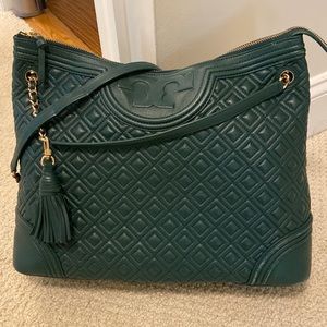 Tory Burch dark evergreen quilted leather bag with gold chain strap.